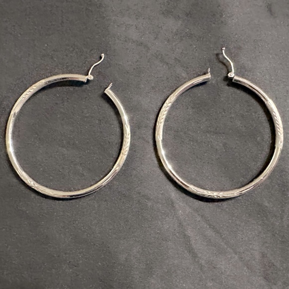 Jewelry - 14K WG diamond etched hoops
Inner diameter 49.3mm or 2”
SOLID white gold